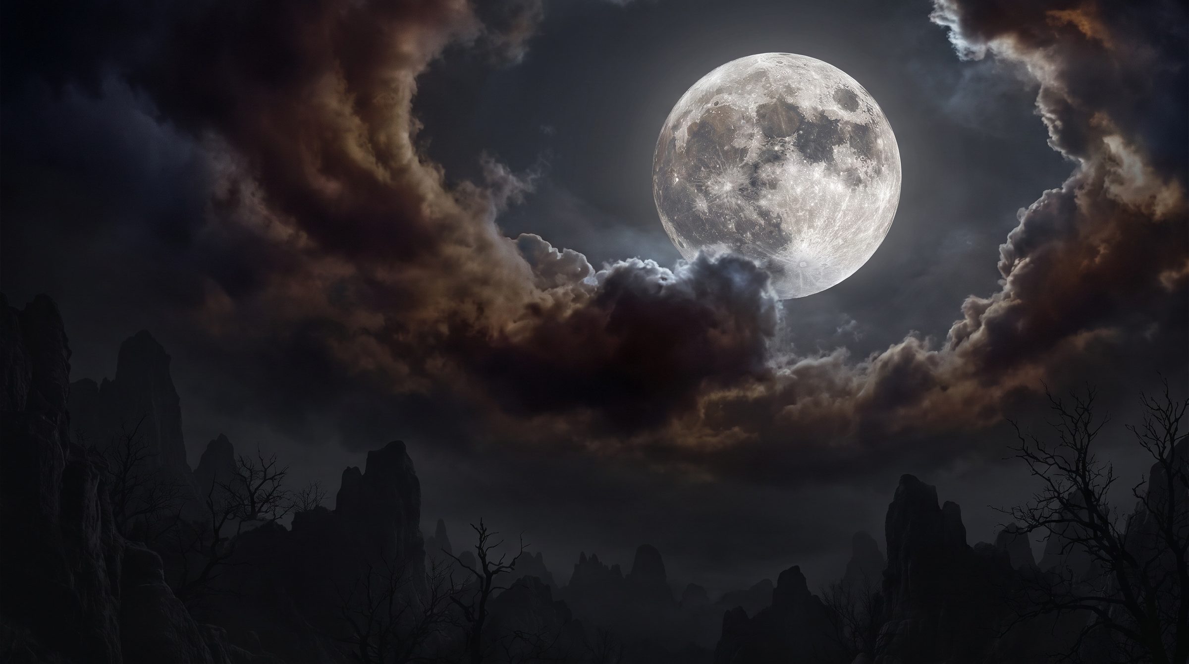 Full moon breaking through dark clouds above a shadowed landscape